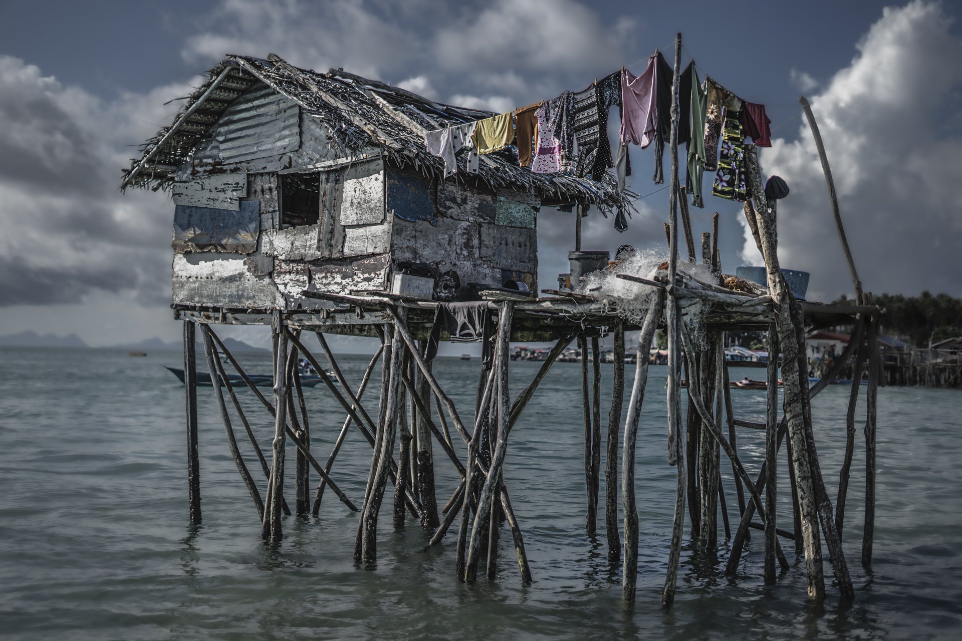 Malaysia, Denawan island, 2024-05-09. Bajau Laut stilt house in a Bajau village illustrating the precarity of this lifes