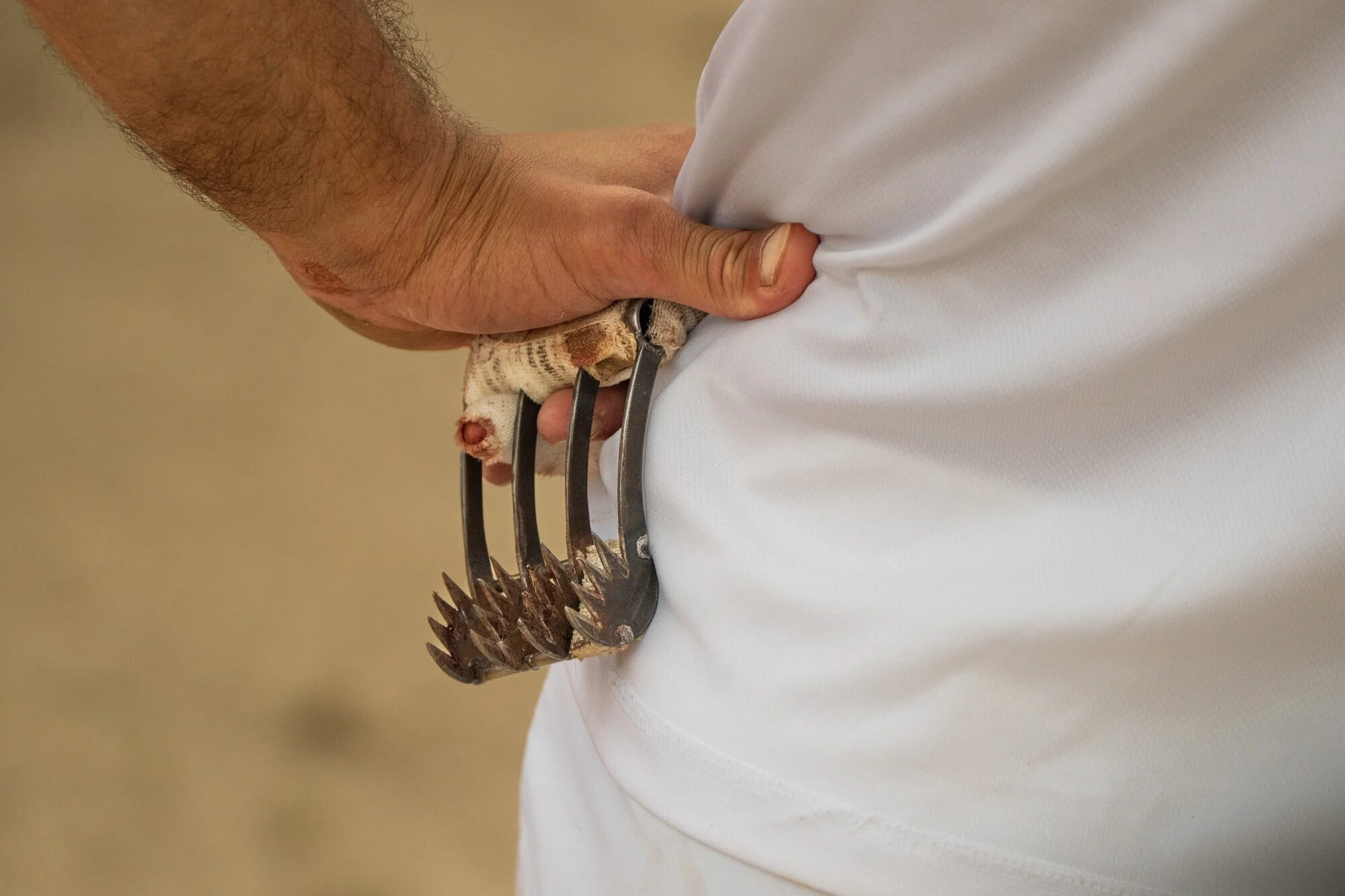 France, Port-Saint-Louis du rhone, 2026-05-17. During a course camarguaise, a raseteur, a participant in this traditiona