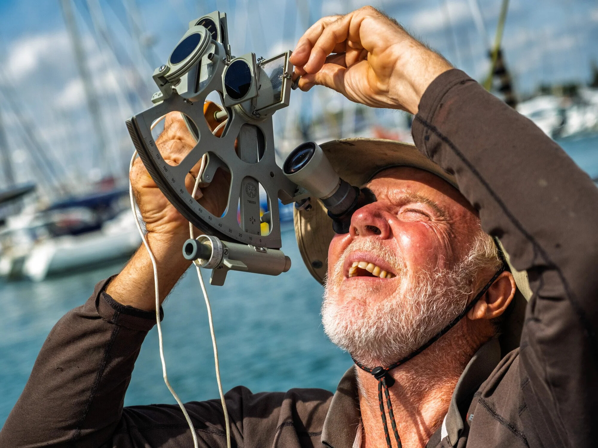 France, Les Sables d Olonne, 2022-08-26. Australian sailor Mark Sinclair practises with his sextant ahead of the 2022 Go