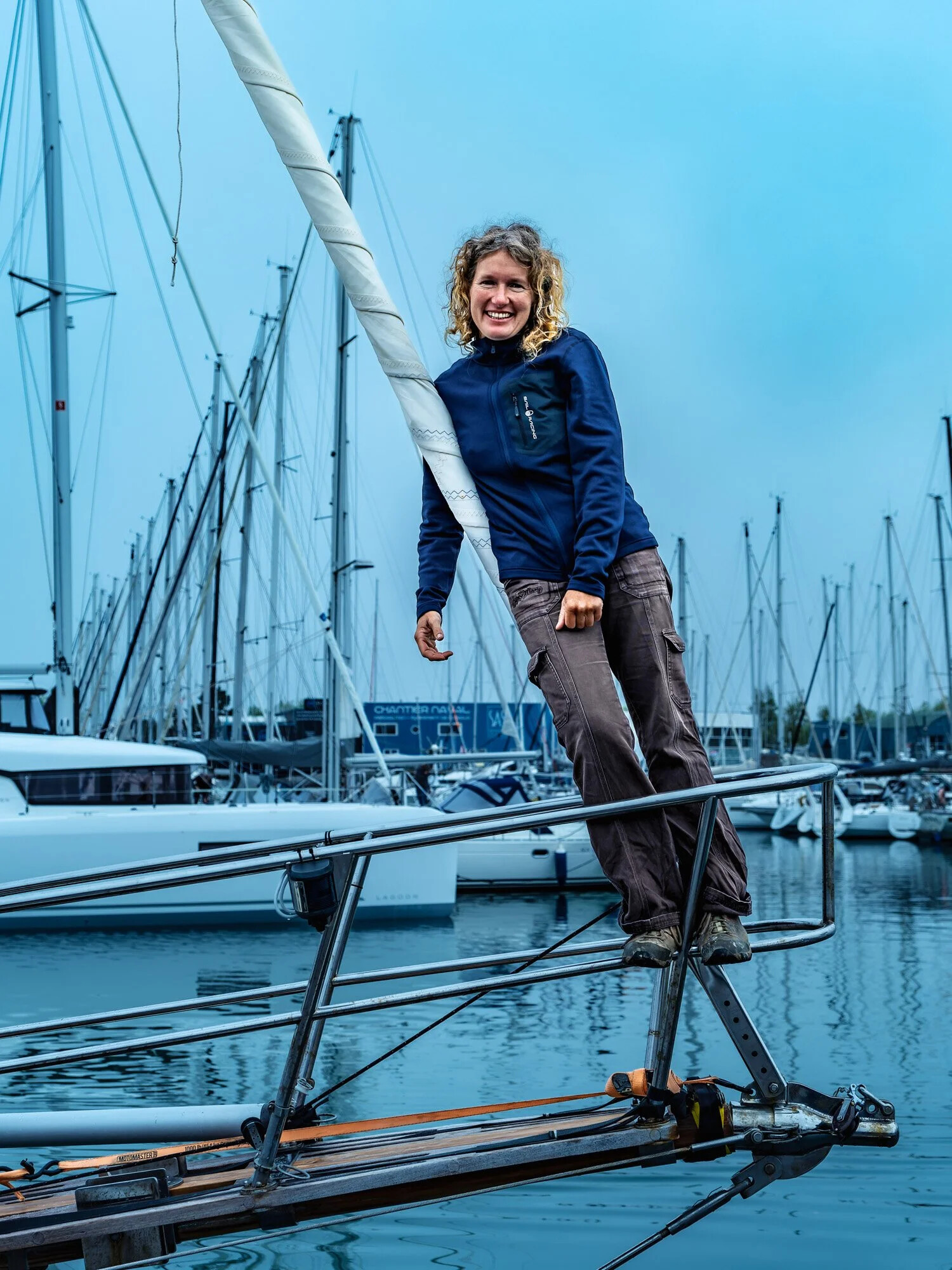 France, Les Sables d Olonne, 2023-04-28. Portrait of South African sailor Kirsten Neuschafer on the bow of her yacht Min