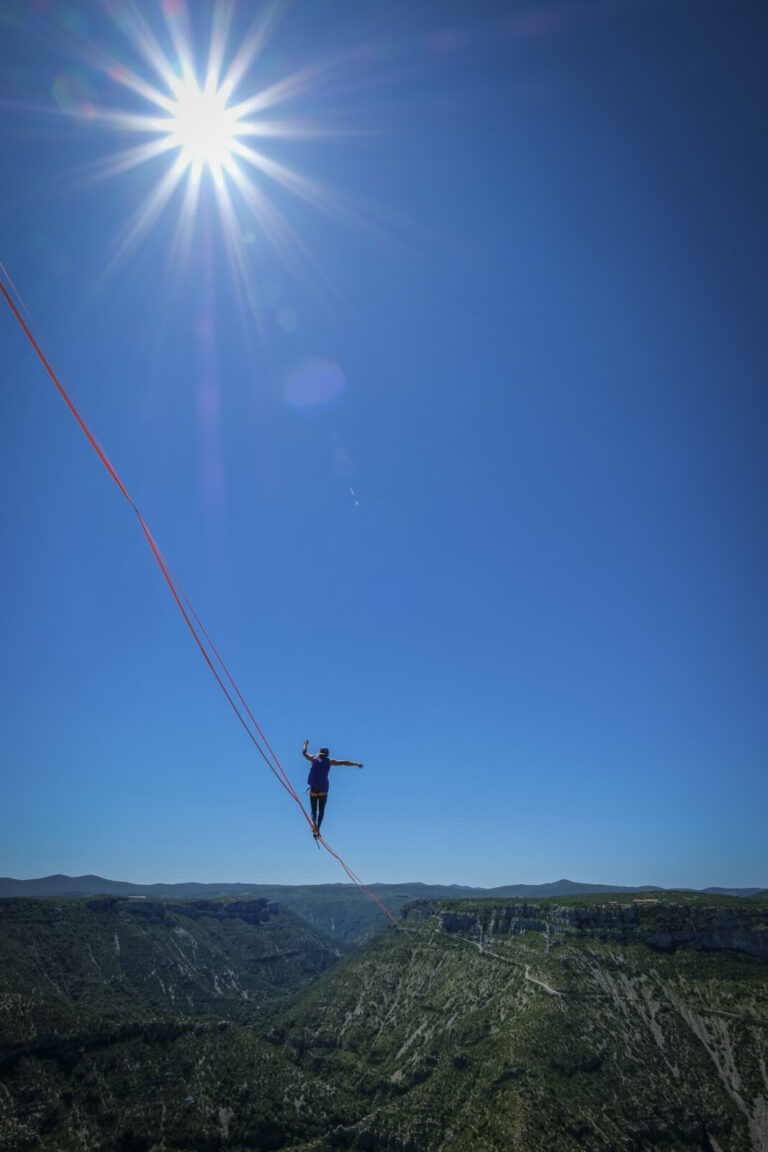 France, Navacelles, 2017-06-08. In the Cirque de Navacelles a 1662 metre highline is rigged from one rim of the canyon t