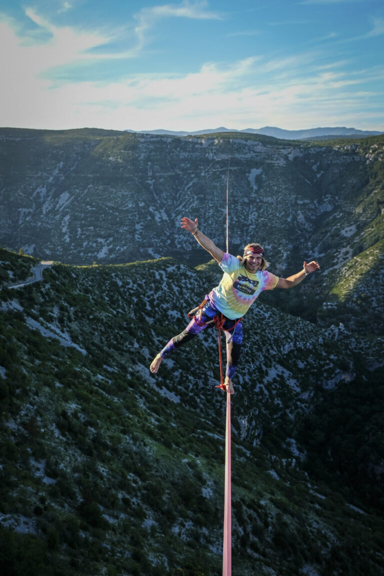 France, Navacelles, 2017-06-08. In the Cirque de Navacelles a 1662 metre highline is rigged from one rim of the canyon t