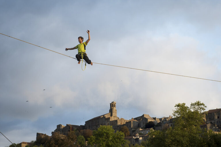 France, Cordes-sur-Ciel, 2014-10-03. Sixty years after Jean Dieuzaide photographed a tightrope walkers wedding above the