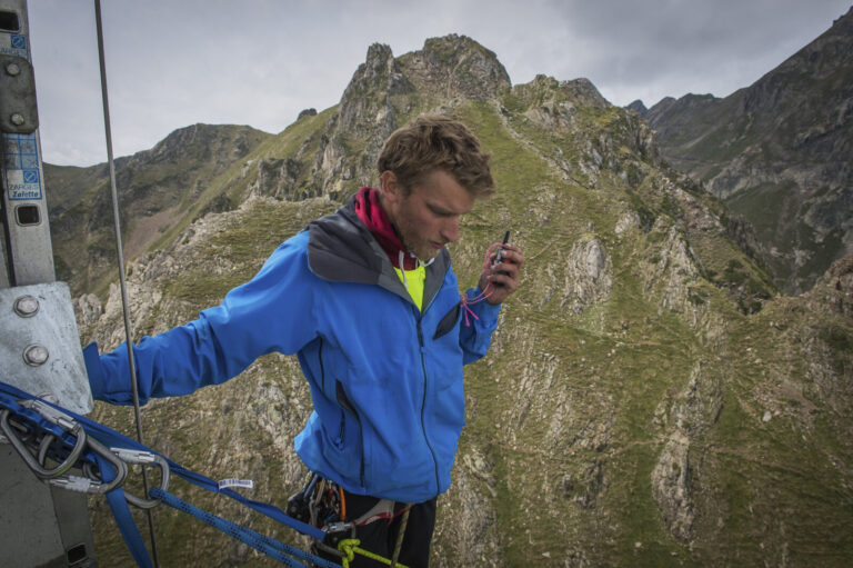 France, La Mongie, 2015-09-02. At the Pic du Midi de Bigorre members of the extreme sports team Pyrenaline rig the cable