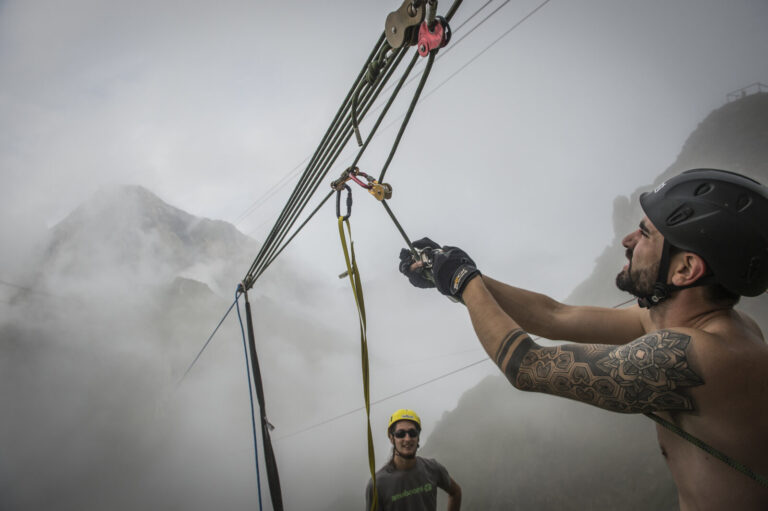 France, La Mongie, 2015-09-02. At the Pic du Midi de Bigorre members of the extreme sports team Pyrenaline rig the cable