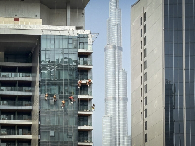 United Arab Emirates, Dubai, 2023-10-21. In the Business Bay district, towers rise along the Dubai Water Canal within si