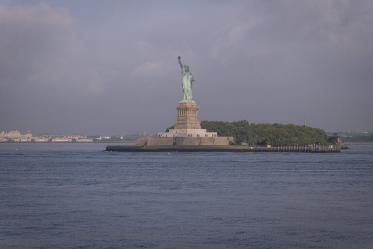 United States, New York, 2026-08-06. The Statue of Liberty and Liberty Island in the morning mist. Photograph by Fred MA