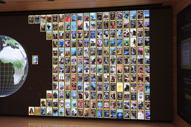 United States, Washington, 2026-08-11. The wall of covers of National Geographic Magazine, arranged around a globe. Phot