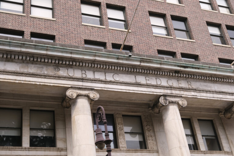 United States, Philadelphia, 2026-08-14. The carved name of the Public Ledger, a former Philadelphia daily newspaper, on
