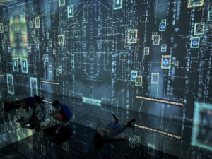 United States, Washington, 2026-08-12. Visitors in the immersive room on cyber threats, surrounded by projections. Photo