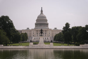 United States, Washington, 2026-08-12. Axial view of the United States Capitol, the Grant Memorial and the Capitol Refle