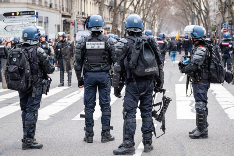 France, Lyon, 2023-03-07. Gendarmes with backpacks and defensive equipment during the demonstration against the pension 