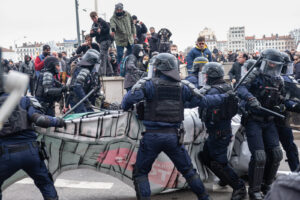 France, Lyon, 2023-03-07. Intervention of the police who want to recover the banner of the black blocks during the demon