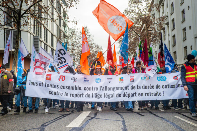 France, Lyon, 2023-01-19. Demonstration against the government's pension reform. The head banner with the unions behind 