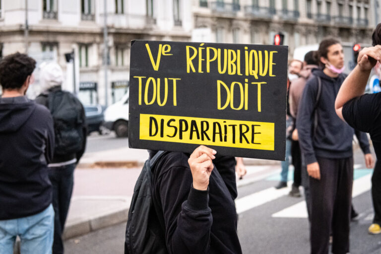 France, Lyon, 2025-09-10. A sign reading '5th Republic, everything must disappear' during the social movement 'Let's blo