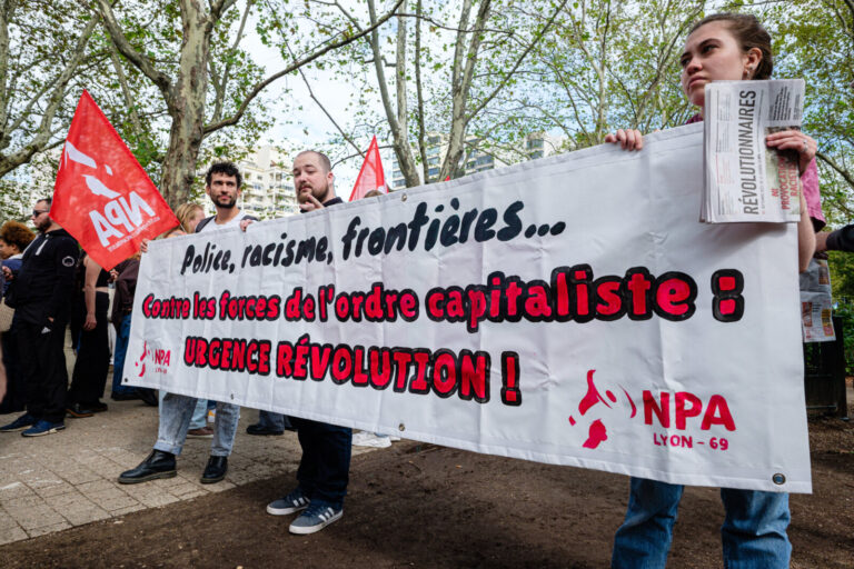 France, Lyon, 2023-09-23. Unity march for social justice, against police violence and racism. NPA banner against the for