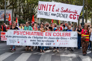 France, Lyon, 2026-09-29. Mobilization and national civil service strike, with a banner reading Psychiatry in Anger in t