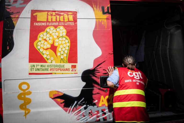 France, Lyon, 2023-04-28. A demonstration for the World Day for Safety and Health at Work. The poster for the May Day de