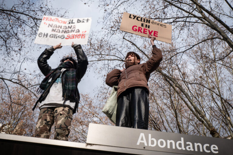 France, Lyon, 2023-01-31. Demonstration against the government's pension reform. High school girls with signs on strike 