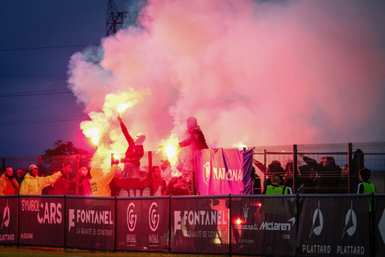France, Chasselay, 2024-05-03. Supporters of the Nimes football team with smokers during the National championship match