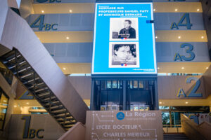 France, Lyon, 2024-10-14. Poster with photos of the portraits of teachers Samuel Paty and Dominique Bernard for the trib