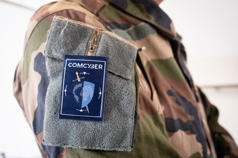 France, Lyon, 2026-03-30. Comcyber insignia on a soldier's arm during the national ORION exercise at the Hospices Civils