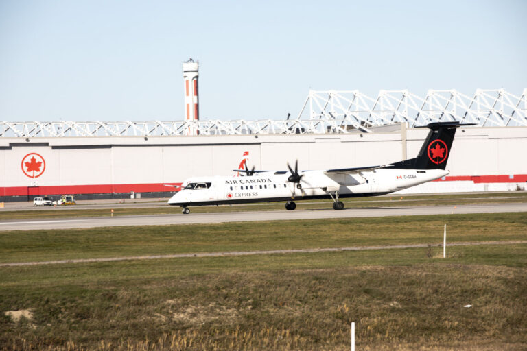 Canada, Montreal, 2021-11-10. Airline aircraft taxiing on the runway at Montreal-Trudeau Airport (YUL), Canada's third b