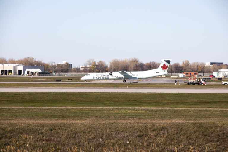 Canada, Montreal, 2021-11-10. Airline aircraft taxiing on the runway at Montreal-Trudeau Airport (YUL), Canada's third b