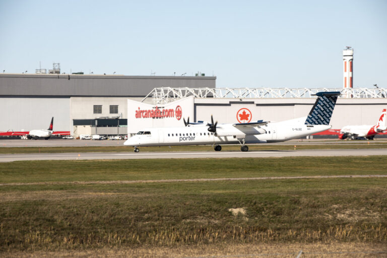 Canada, Montreal, 2021-11-10. Airline aircraft taxiing on the runway at Montreal-Trudeau Airport (YUL), Canada's third b