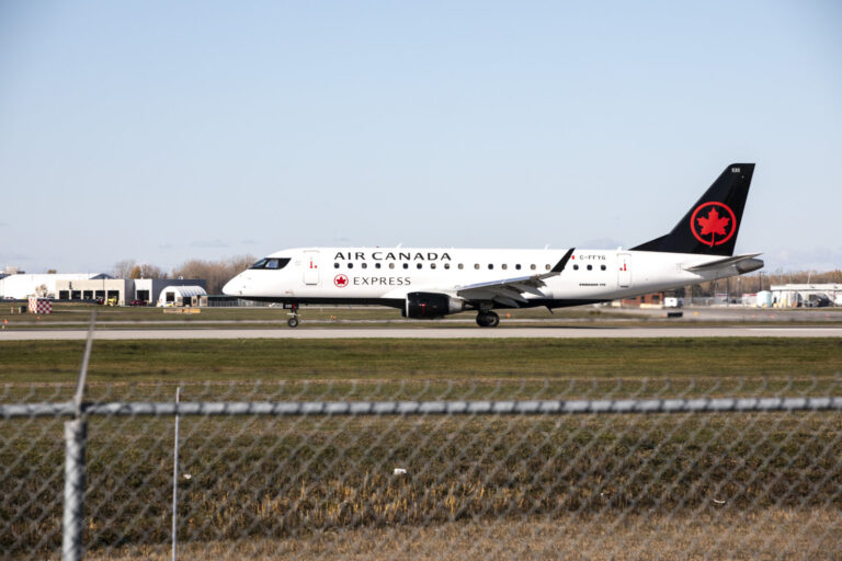 Canada, Montreal, 2021-11-10. Airline aircraft taxiing on the runway at Montreal-Trudeau Airport (YUL), Canada's third b