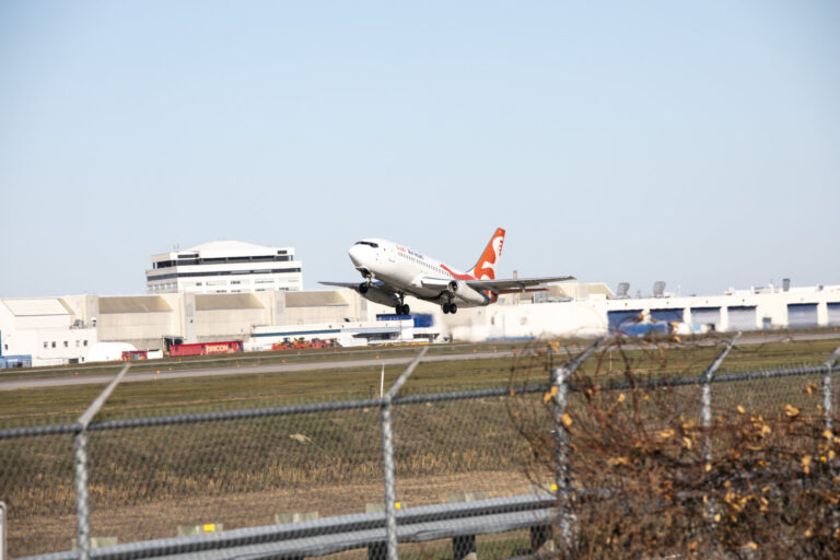 Canada, Montreal, 2021-11-10. Airliner taking off from the runway at Montreal-Trudeau Airport (YUL), Canada's third busi