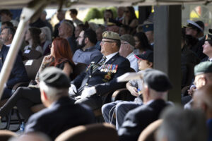 Canada, Drummondville, 2026-09-12. A Canadian veteran in dress uniform adorned with military medals and wearing white gl
