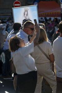 France, Paris, 2026-09-25. Faithful and spectators gather along Boulevard Saint-Michel on Paris's Left Bank, waiting for