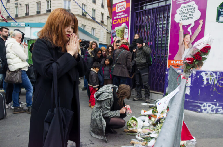 France, Paris, 2015-11-14. In the aftermath of the November 13 attacks in Paris, thousands gathered outside the Bataclan