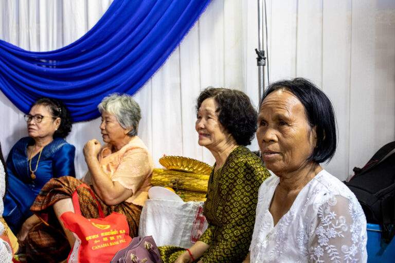 Cambodia, Phom Penh, Tuol Kok, 2019-11-29. A religious wedding ceremony takes place near the railway. Photography by Guy