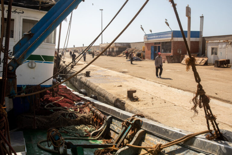Morocco, Essaouira, 2019-09-27. View from the deck of a trawler overgrown with ropes and nets. The quay is very infreque