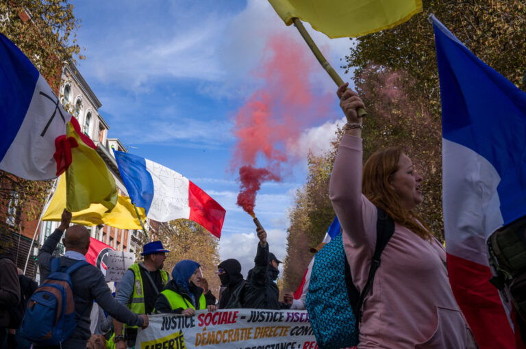 France, Lille, 2022-10-22. Yellow waistcoats demonstration. View of the banners, flags and placards carried by the demon