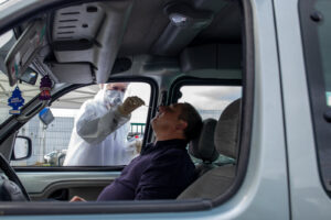 France, Lille, 2020-04-28. In the context of the sanitary crisis, a biologist performs a "covid-19 car testing". Photogr