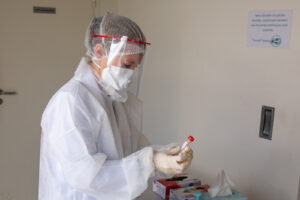 France, Lille, 2020-04-28. In the context of the sanitary crisis, a biologist performs a "covid-19 car testing". Photogr