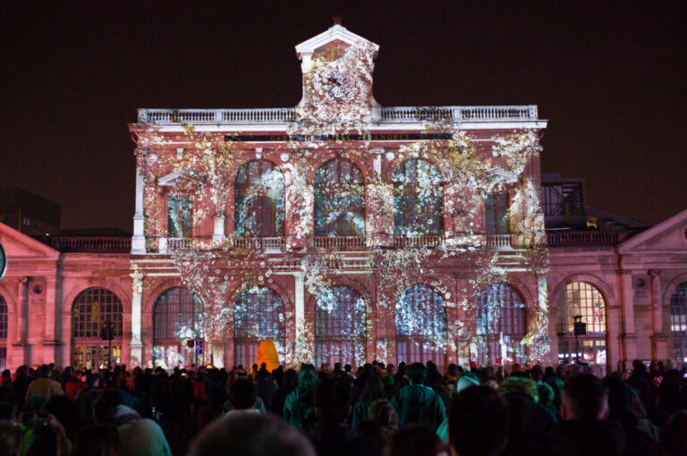 France, Lille, 2023-04-08. Illumination of the facade of Lille-Flandres station. For one weekend, the Video Mapping Fest