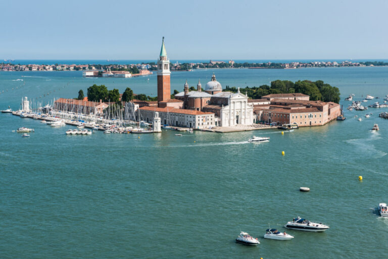 Italy, Venice, 2018-07-14. Aerial view on the iconic San Giorgio Maggiore island and the Venitian lagoon. Photograph by 