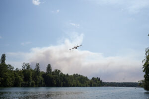 France, Fontainebleau, 2026-07-13. A large plume of smoke rises above Fontainebleau as a major wildfire spreads through