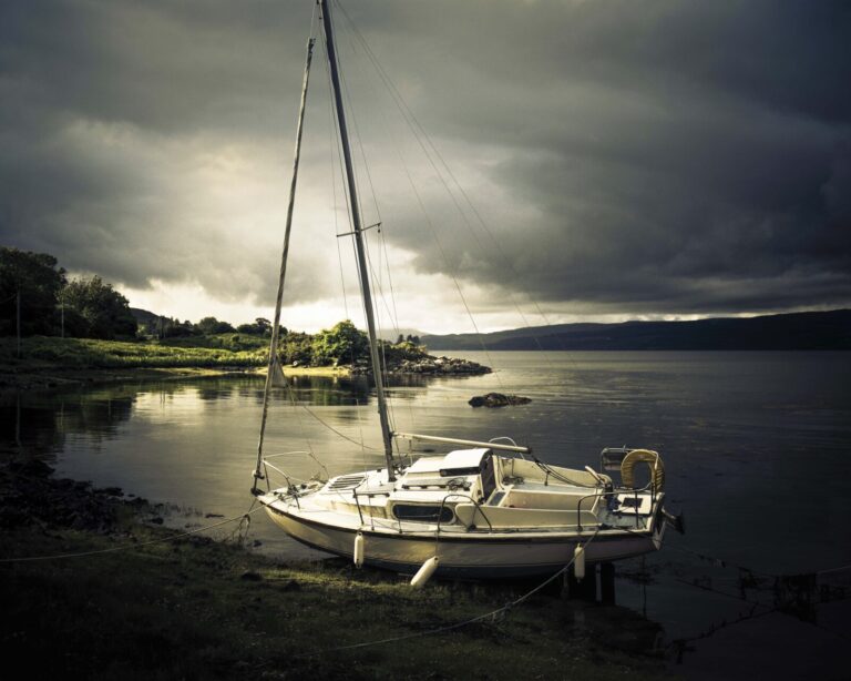 Scotland, Isle of Mull, 2017-06. A sailboat sits on the ground at low tide. Scan from a 6x7 negative film. Photograph by