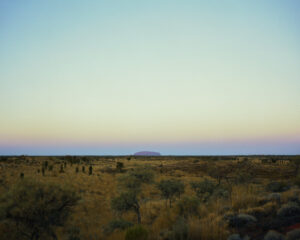 Australia, Uluru-Kata Tjuta National Park, 2012-08. The sun rises at Uluru/Ayers Rock, in the Australian outback, south