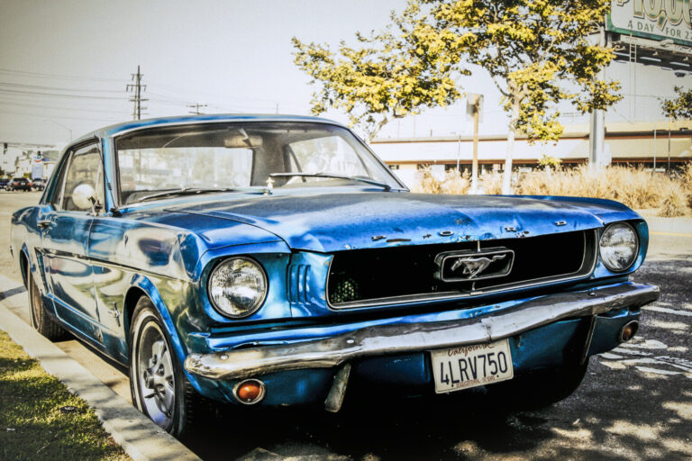 USA, Los Angeles, 2008-07-16. A 1966 blue Ford Mustang is parked on the street. Photograph by Pierre OLLIER / Collectif 