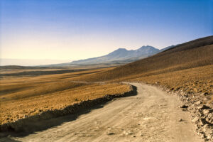 Chile, near San Pedro de Atacama, 2014-08. A dirt road in the Atacama Desert. Scan from a 24x36 negative film. Photograp