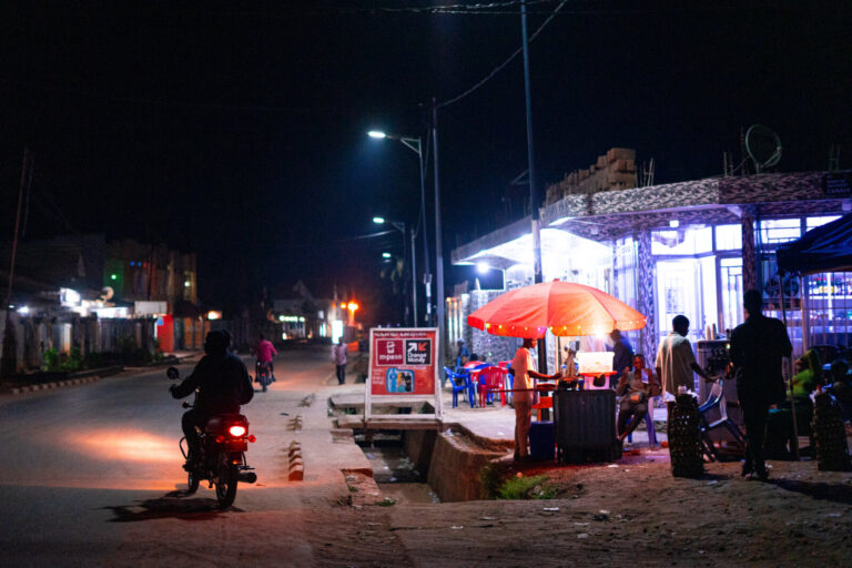 Democratic Republic of Congo, Mbujimayi, 2024-10-31. A nighttime street scene in the city that once powered the nation's