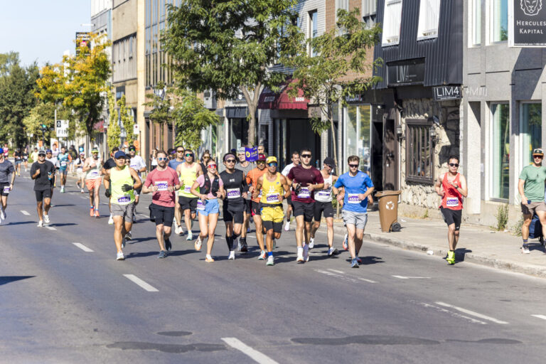 Canada, Montreal, 2025-09-21. A group of focused runners during the 2025 Montreal Marathon at the 30th kilometer mark. T