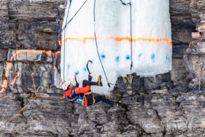 Canada, Pont-Rouge, 2025-02-22. Climber Jerome St Michel suspended in a horizontal position during the difficulty compet